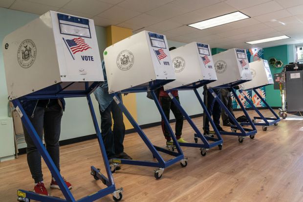 People seen voting at a polling station in the Bronx on election day. People seen voting at a polling station in the Bronx on election day to illustrate hope for US reforms as student voters make voices heard in midterms