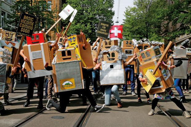 people dressed in boxes with banners as robots people dressed in boxes with banners as robots