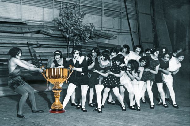 Tug of war Marta Farra, the 'Hercules girl' at a tug of war with gold cup