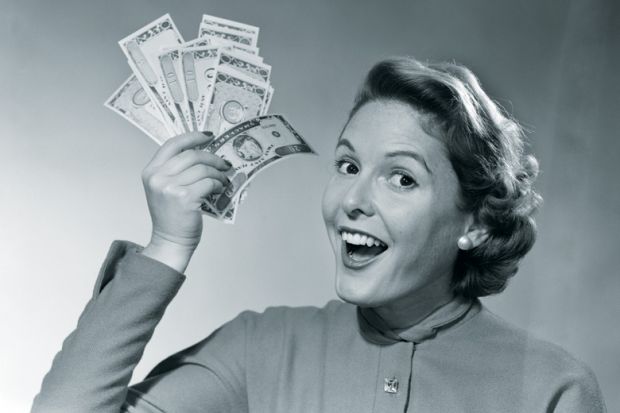 Woman holding handful of cash (black and white) Woman holding handful of cash (black and white)