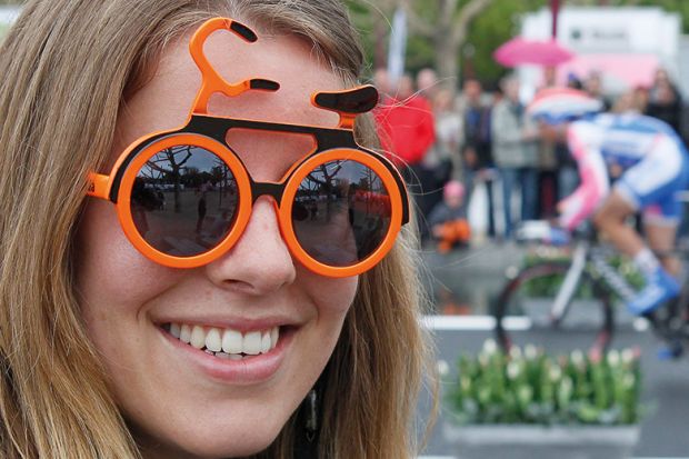 Woman with bicycle sunglasses