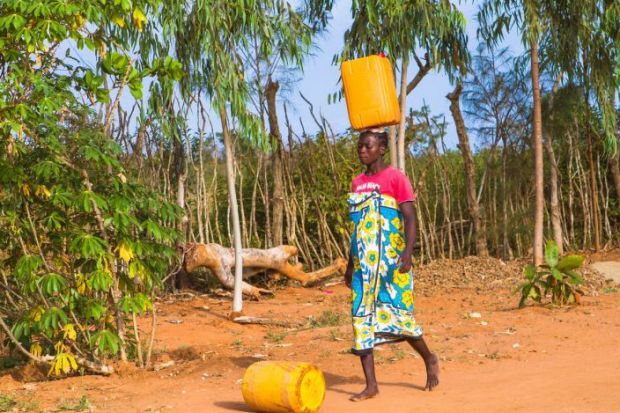 Woman carrying water