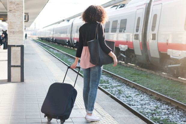 Woman waiting for train