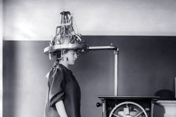 A woman wearing an electronic headset A woman wearing an electronic headset