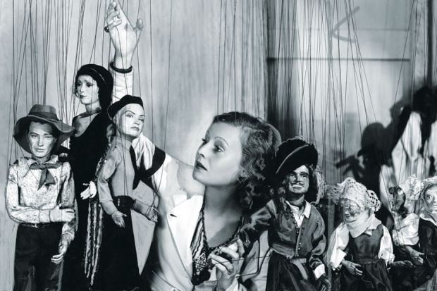 Young woman playing with puppets Young woman playing with puppets