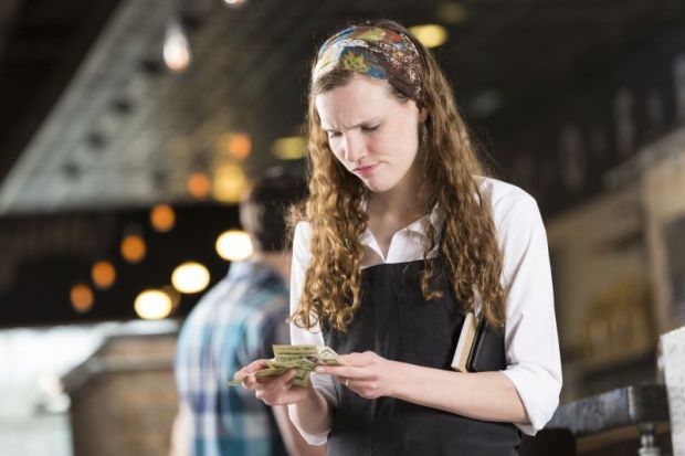 Young woman with little money