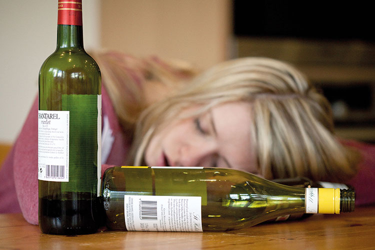 Woman passed out from drinking wine Woman passed out from drinking wine