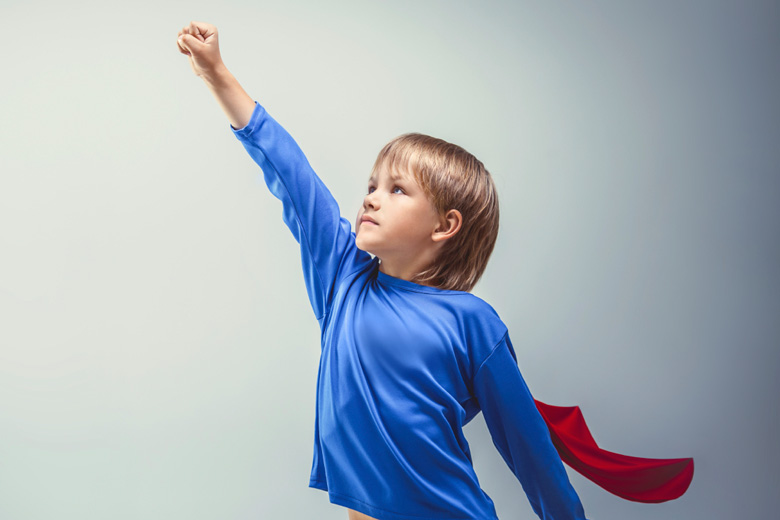 Young boy dressed as superhero, world's best young universities Young boy dressed as superhero, world's best young universities